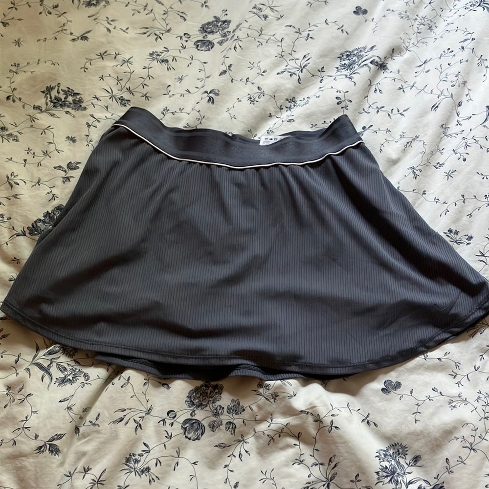 Awesome Nike tennis skirt. Gray/purple color. Excellent used condition.